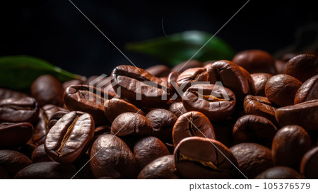 Brown roasted coffee beans close up on black background 105376579