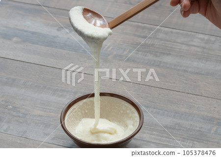 Japanese yam ladle scooped with a spoon Japanese yam ladle scooped with a spoon 105378476