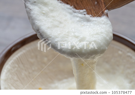 Japanese yam ladle scooped with a spoon 105378477