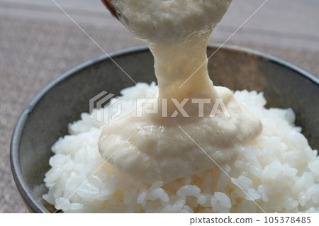Japanese yam ladle scooped with a spoon 105378485