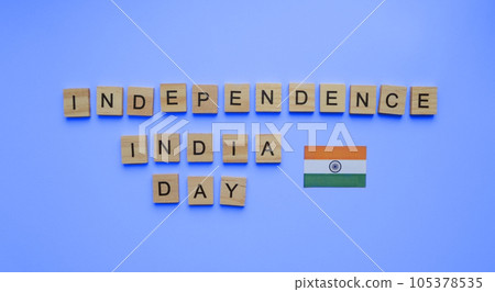 August 15, Independence Day in India, flag of India, minimalistic banner with the inscription in wooden letters on a blue background 105378535