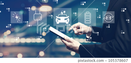 EV concept with businessman using a tablet EV concept with businessman using a tablet 105378607