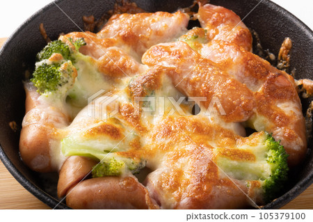 Wiener and broccoli grilled with cheese Wiener and broccoli grilled with cheese 105379100