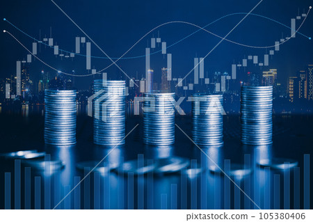 Stack of money coin on office desk with blur background of city building and trading graph. Business and financial concept.  105380406