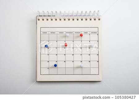 Calendar page pinned in calender on date, business meeting schedule or travel planning concept. and reminder concept. Calendar appointment 105380427