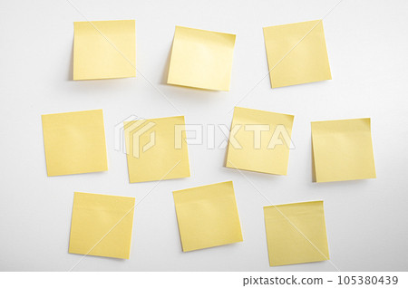 blank yellow sticky notes mockup on white background. Yellow sticky notes with things to do on office board. Mockup sticky Note Paper 105380439