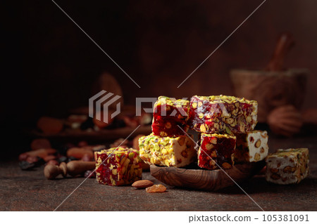 Turkish delight with nuts and dried fruits. 105381091