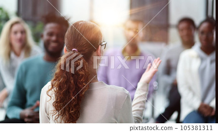 young business woman giving a presentation in a conference room. 105381311