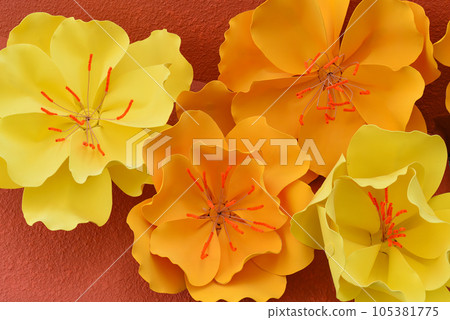 artificial orange and yellow flowers made of polyurethane as a decorating in Vietnamese street artificial orange and yellow flowers made of polyurethane as a decorating in Vietnamese street 105381775