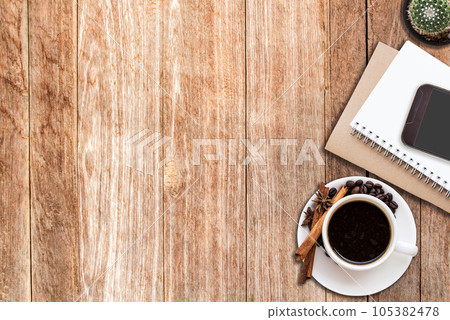 Office desk with coffee cup and smart phone 105382478