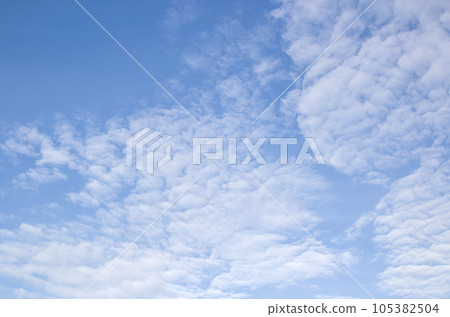 White clouds in the blue sky 105382504