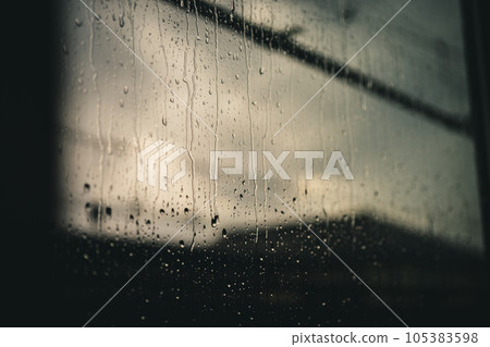 Window glass of a house wet from the rain Window glass of a house wet from the rain 105383598