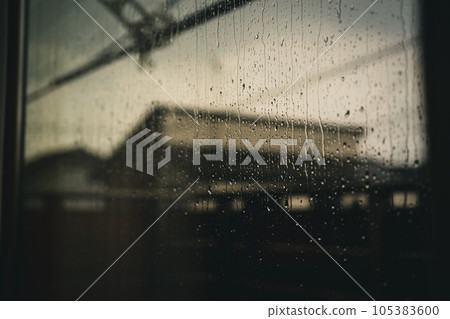 Window glass of a house wet from the rain Window glass of a house wet from the rain 105383600