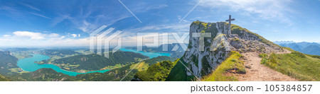 landscape with top of Mount Schafberg with cross and mountains and Lake Mondsee and Attersee, Alps, Austria 105384857