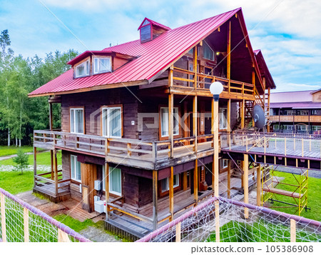The ski base is in autumn. The ski base is in autumn. 105386908