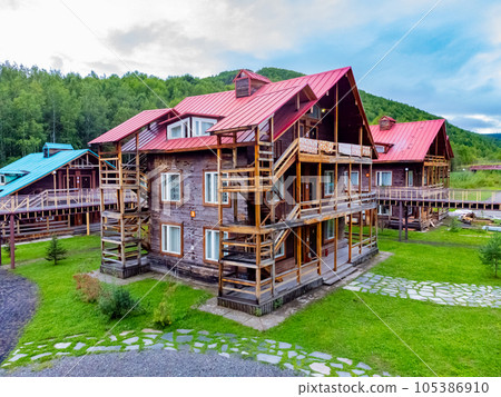 The ski base is in autumn. 105386910