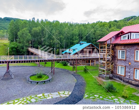 The ski base is in autumn. The ski base is in autumn. 105386912