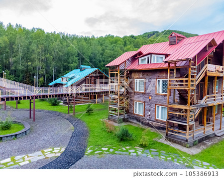 The ski base is in autumn. The ski base is in autumn. 105386913