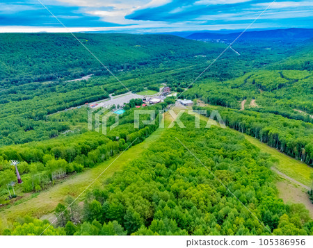 The ski base is in autumn. The ski base is in autumn. 105386956