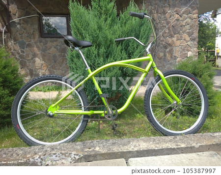 Stylish green bicycle Stylish green bicycle 105387997