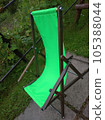Relax and unwind in style with our exquisite wooden recliner chair featuring lush green fabric. 105388044