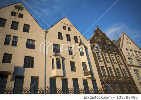 Golden sunlight on buildings in Bergen in Norway 105388480