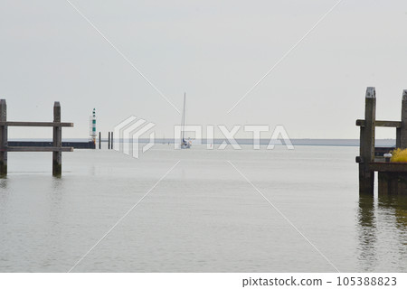 Den Oever, Netherlands. July 5, 2023. The harbor head of the port of Den Oever. 105388823