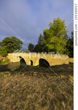 Romanesque bridge of Artigue and river Osse near Larressingle on route to Santiago de Compostela, UNESCO World Heritage Site, departement Gers, France Romanesque bridge of Artigue and river Osse near Larressingle on route to Santiago de Compostela, UNESCO World Heritage Site, departement Gers, France 105388917