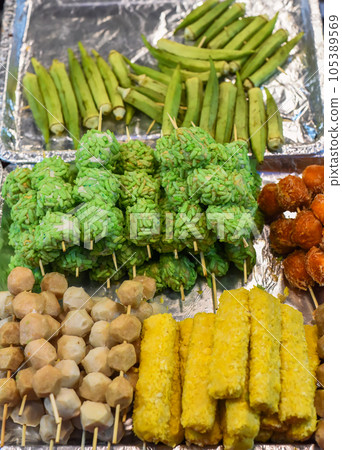 Many snacks and seafood in vietnamese night market in food festival Many snacks and seafood in vietnamese night market in food festival 105389569