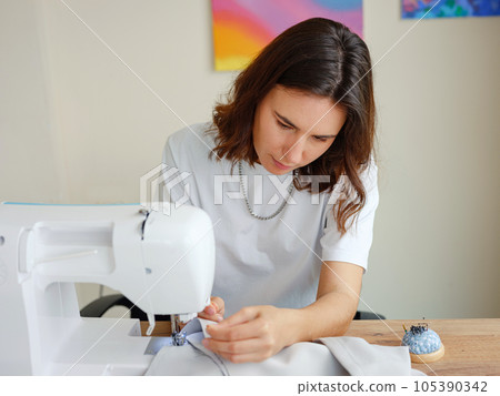 Workplace of a dressmaker. Handmade concept. Workplace of a dressmaker. Handmade concept. 105390342