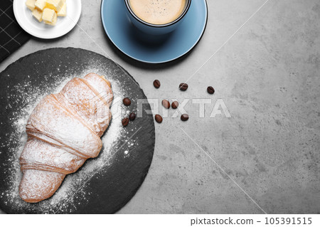Flat lay composition with tasty croissant on grey table, space for text Flat lay composition with tasty croissant on grey table, space for text 105391515