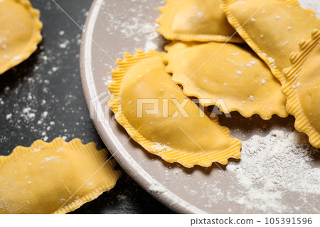 Ravioli on grey table, closeup view. Italian pasta 105391596