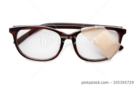 Glasses with sticking plaster isolated on white, top view Glasses with sticking plaster isolated on white, top view 105393729