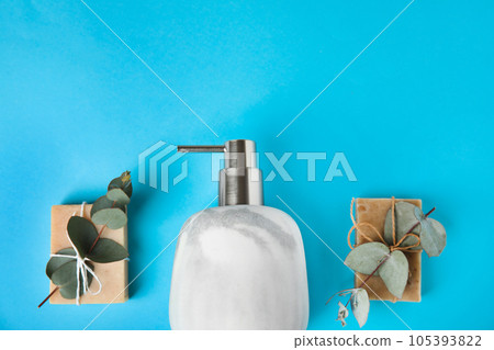 Flat lay composition with marble soap dispenser on light blue background. Space for text Flat lay composition with marble soap dispenser on light blue background. Space for text 105393822