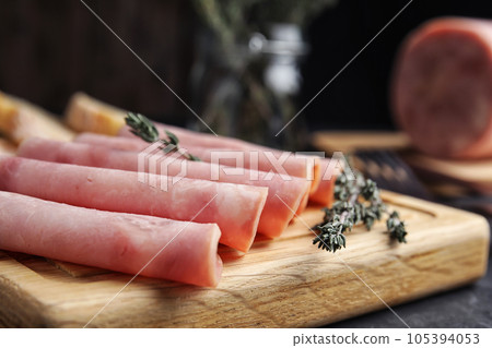 Slices of tasty ham on table, closeup 105394053