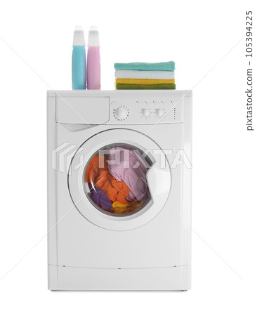Modern washing machine with laundry, stack of towels and detergents on white background Modern washing machine with laundry, stack of towels and detergents on white background 105394225