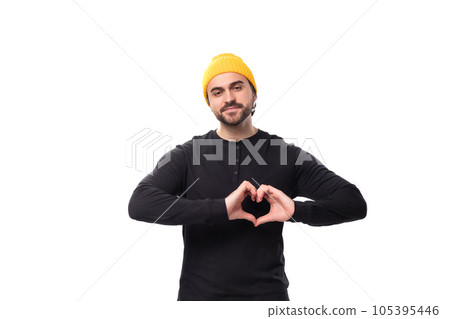 young friendly caucasian brunette man with beard in casual sweatshirt young friendly caucasian brunette man with beard in casual sweatshirt 105395446