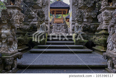 Pura Gunung Lebah,  Gunung Lebah Temple is an Ancient temple in scenic jungle surrounds with ornate carvings  colorful statues located in Ubud, Bali 105396517