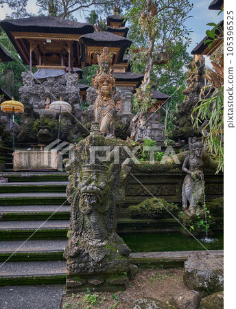 Pura Gunung Lebah, Gunung Lebah Temple is an Ancient temple in scenic jungle surrounds with ornate carvings colorful statues located in Ubud, Bali Pura Gunung Lebah, Gunung Lebah Temple is an Ancient temple in scenic jungle surrounds with ornate carvings colorful statues located in Ubud, Bali 105396525
