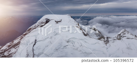 Mt Baker covered in snow and clouds. Aerial landscape nature background. 105396572