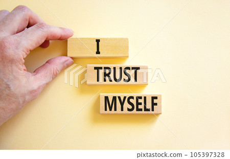 I trust myself symbol. Concept words I trust myself on wooden blocks. Businessman hand. Beautiful white table white background. Business, psychological and I trust myself concept. Copy space. I trust myself symbol. Concept words I trust myself on wooden blocks. Businessman hand. Beautiful white table white background. Business, psychological and I trust myself concept. Copy space. 105397328