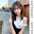 A beautiful female high school model staring at this 105402293