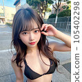 A beautiful female high school model staring at this 105402298