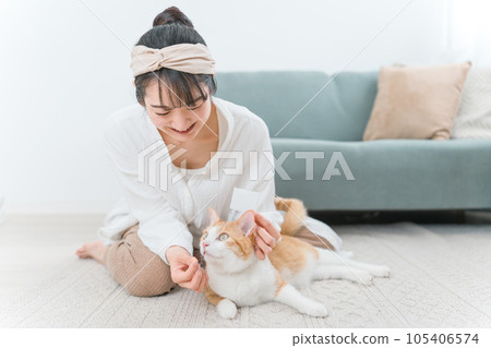 Owner and cat trying to take medicine (medication / illness) 105406574