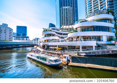 Cityscape of Yokohama, Japan Viewing the Yokohama Bay Quarter, water buses, etc. (Yokohama Station and JR Yokohama Tower in the back left) Cityscape of Yokohama, Japan Viewing the Yokohama Bay Quarter, water buses, etc. (Yokohama Station and JR Yokohama Tower in the back left) 105406760
