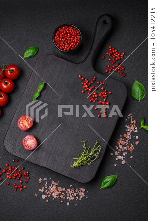 Ingredients for cooking cherry tomatoes, salt, spices and herbs 105412215