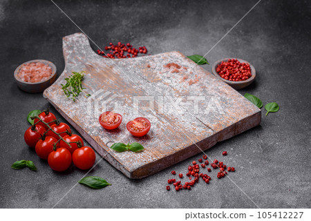 Ingredients for cooking cherry tomatoes, salt, spices and herbs Ingredients for cooking cherry tomatoes, salt, spices and herbs 105412227