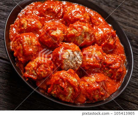 Iowa Ham Balls with tomato sauce in bowl Iowa Ham Balls with tomato sauce in bowl 105413905