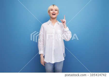 young positive caucasian office worker woman with bob hairstyle and dressed in white blouse. people 105414742