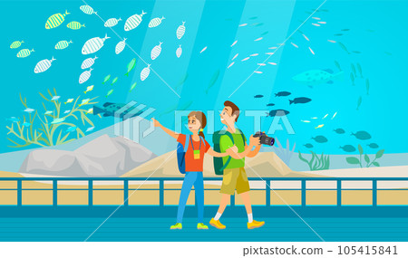 Couple with camera takes pictures of fishes oceanarium. People making photo of underwater scenery 105415841